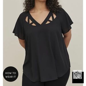 Torrid black cage cutout blouse